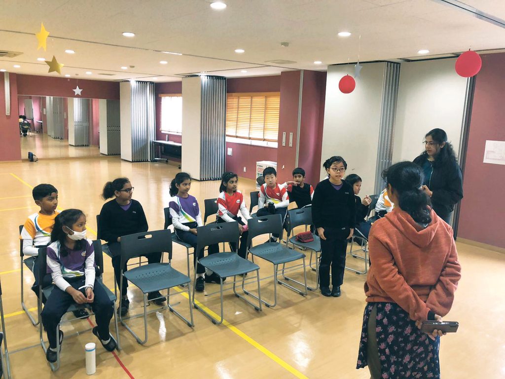 A student of Global Indian International School, Nishi Kasai, spells a word during the school’s bee contest. | GLOBAL INDIAN INTERNATIONAL SCHOOL, NISSY KASAI